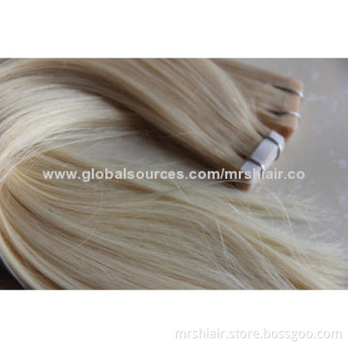 24-inch pale color Malaysian straight tape in hair